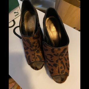 Leopard print wedge heels with black zipper